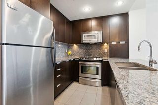 Photo 5: 404 99 Spruce Place SW in Calgary: Spruce Cliff Apartment for sale : MLS®# A2114382