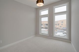 Photo 22: 224 7820 Spring Willow Drive SW in Calgary: Springbank Hill Row/Townhouse for sale : MLS®# A1172953