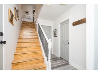 Photo 2: 34612 6TH Avenue in Abbotsford: Poplar House for sale in "Huntington Village" : MLS®# R2568891