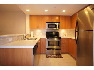 Photo 1: 607 295 GUILDFORD Way in Port Moody: North Shore Pt Moody Condo for sale in "THE BENTLEY" : MLS®# V868346