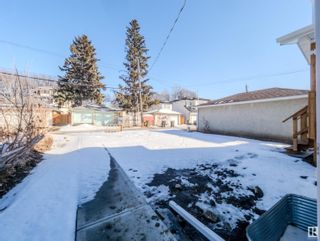 Photo 5: 11221-11223 94 Street in Edmonton: Zone 05 Duplex Front and Back for sale : MLS®# E4376663