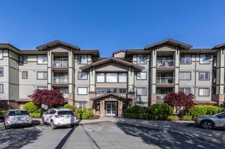 Photo 1: 406 2038 SANDALWOOD Crescent in Abbotsford: Central Abbotsford Condo for sale in "Element" : MLS®# R2880696