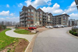 Photo 1: 403 7809 209 Street in Langley: Willoughby Heights Condo for sale in "Wyatt" : MLS®# R2651476