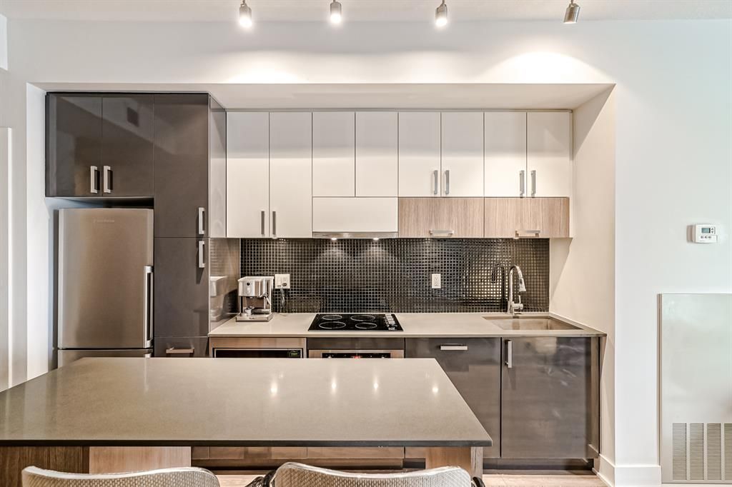 Main Photo: 422 619 Confluence Way SE in Calgary: Downtown East Village Apartment for sale : MLS®# A1259445