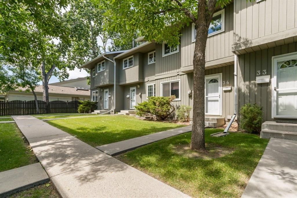 Main Photo: 34 6503 RANCHVIEW Drive NW in Calgary: Ranchlands Row/Townhouse for sale : MLS®# A1018661