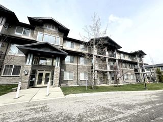 Photo 1: 108 10 Panatella Road NW in Calgary: Panorama Hills Apartment for sale : MLS®# A2128651