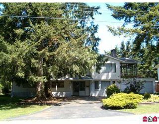 Photo 1: 20691 45A Avenue in Langley: Langley City House for sale in "Mossey Estates" : MLS®# F2714330