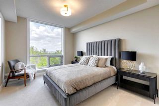 Photo 2: 109 15 Cougar Ridge Landing SW in Calgary: Patterson Apartment for sale : MLS®# A2060663