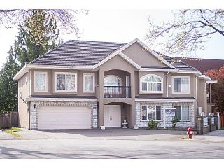 Photo 1: 12321 91A Avenue in Surrey: Queen Mary Park Surrey House for sale : MLS®# F1410080