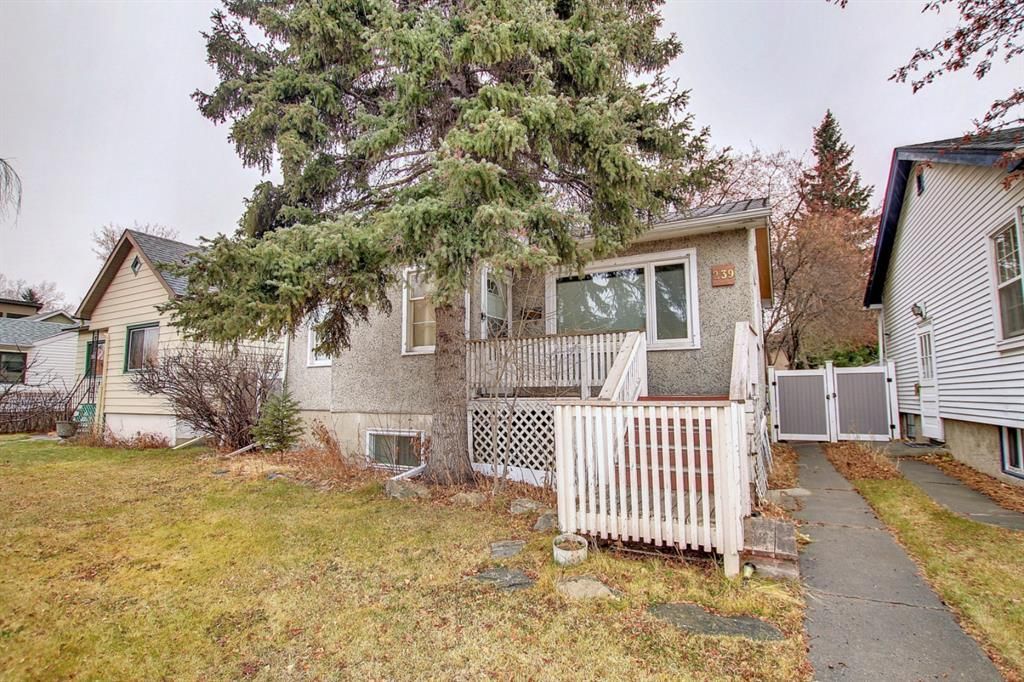 Main Photo: 239 23 Avenue NW in Calgary: Tuxedo Park Detached for sale : MLS®# A2033882