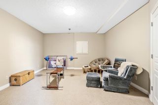 Photo 28: 152 1000 Glen Haven Way: Cochrane Semi Detached (Half Duplex) for sale : MLS®# A1233004