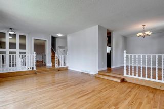 Photo 9: 303 STRAVANAN Bay SW in Calgary: Strathcona Park Detached for sale : MLS®# A1025695