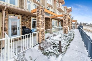 Photo 2: 4 145 Rockyledge View NW in Calgary: Rocky Ridge Row/Townhouse for sale : MLS®# A2018156