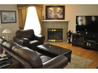 Photo 4: 27 103 FAIRWAYS Drive NW: Airdrie Townhouse for sale : MLS®# C3524229