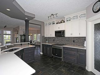 Photo 13: 140 Heritage Lake Boulevard: Heritage Pointe Detached for sale : MLS®# A2100736