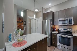 Photo 6: 409 22 Auburn Bay Link SE in Calgary: Auburn Bay Apartment for sale : MLS®# A1209664