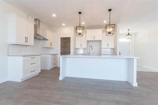 Photo 16: 11 MURANO Cove in Steinbach: R16 Residential for sale : MLS®# 202207858