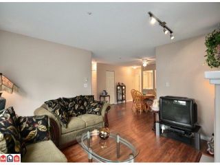 Photo 3: 108 20189 54TH Avenue in Langley: Langley City Condo for sale in "Catalina Gardens" : MLS®# F1025178