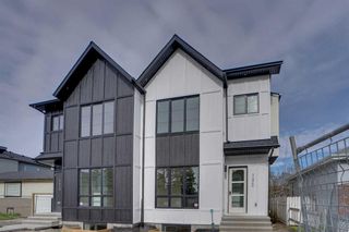 Main Photo: 1420 41 Street SW in Calgary: Rosscarrock Semi Detached (Half Duplex) for sale : MLS®# A2131470
