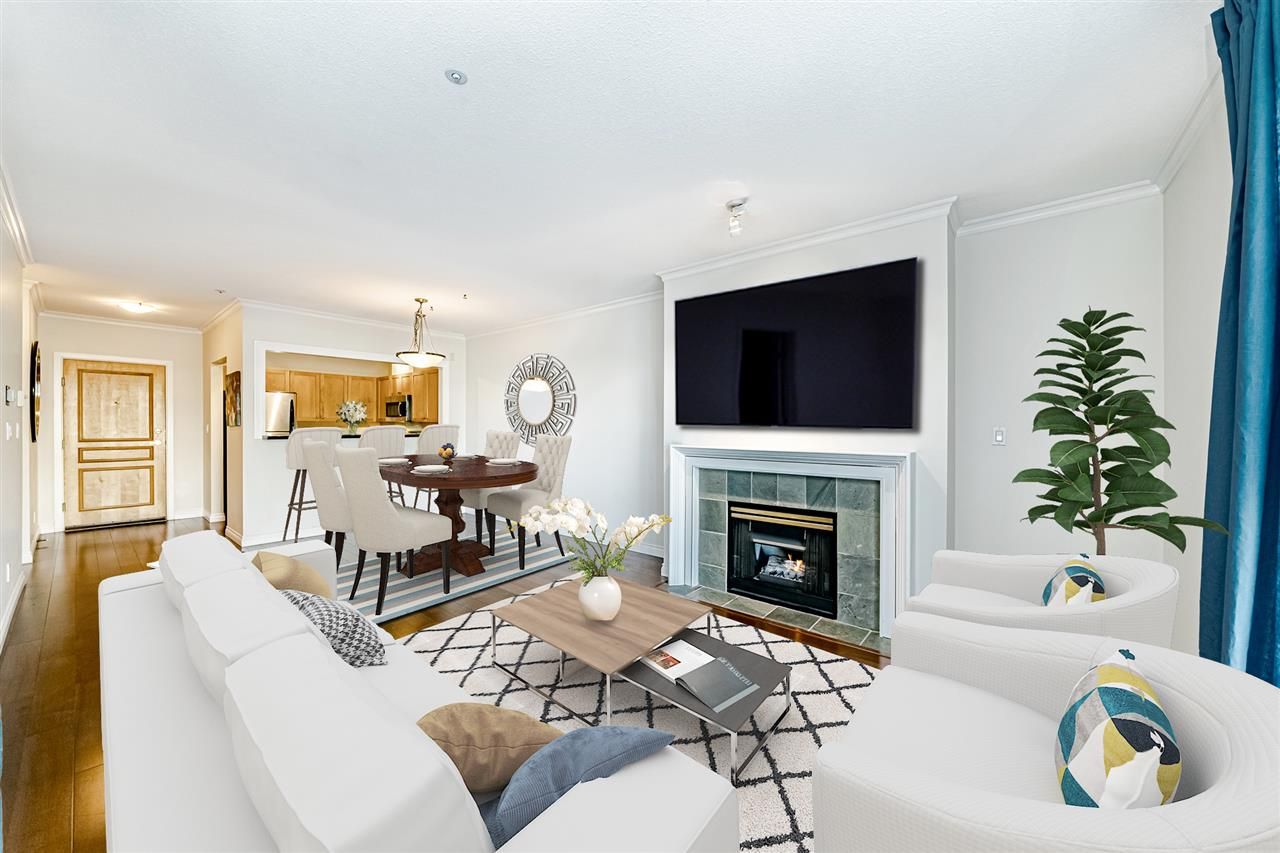 Open Concept Living/Dining Room, Cozy Gas Fireplace (gas included in the strata fees).  Gorgeous engineered hardwood floors, slate floors in the kitchen.