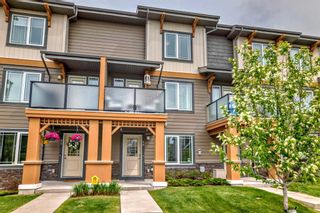 Photo 1: 86 Auburn Meadows View SE in Calgary: Auburn Bay Row/Townhouse for sale : MLS®# A2137461