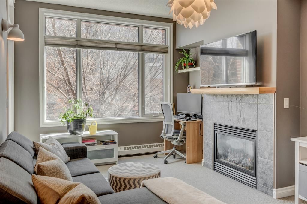 Beautiful sunny unit with gas fireplace!
