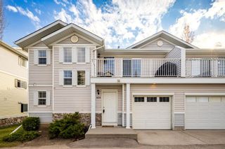 Main Photo: 605 Country Village Cape NE in Calgary: Country Hills Village Row/Townhouse for sale : MLS®# A2131886