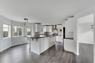 Photo 15: 52 Elmont Rise SW in Calgary: Springbank Hill Detached for sale : MLS®# A2003006
