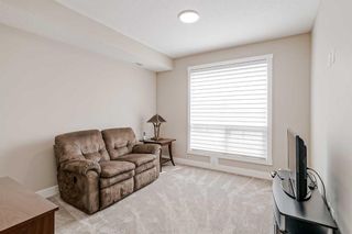Photo 20: 409 15 Cougar Ridge Landing SW in Calgary: Patterson Apartment for sale : MLS®# A2127724