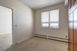Photo 13: 415 26 Val Gardena View SW in Calgary: Springbank Hill Apartment for sale : MLS®# A1257390