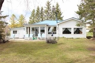 Photo 1: 243 Mcguires Beach Road in Kawartha Lakes: Rural Carden House (Bungalow) for sale : MLS®# X3453643