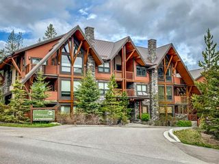 Photo 1: 303 2100A Stewart Creek Drive: Canmore Apartment for sale : MLS®# A1113991