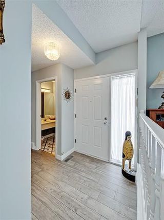 Photo 10: 127 COACHWOOD CR SW in Calgary: Coach Hill House for sale ()  : MLS®# C4229317