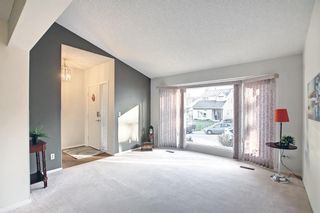 Photo 2: 36 Strathearn Crescent SW in Calgary: Strathcona Park Detached for sale : MLS®# A1152503