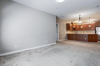 Photo 10: 124 35 Aspenmont Heights SW in Calgary: Aspen Woods Apartment for sale : MLS®# A1232326