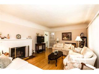 Photo 4: 327 ARBUTUS Street in New Westminster: Queens Park House for sale in "QUEENS PARK" : MLS®# V1081789
