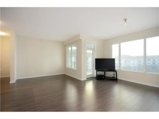 Photo 8: 438 9388 MCKIM Way in Richmond: West Cambie Condo for sale in "Mayfair" : MLS®# V1044028