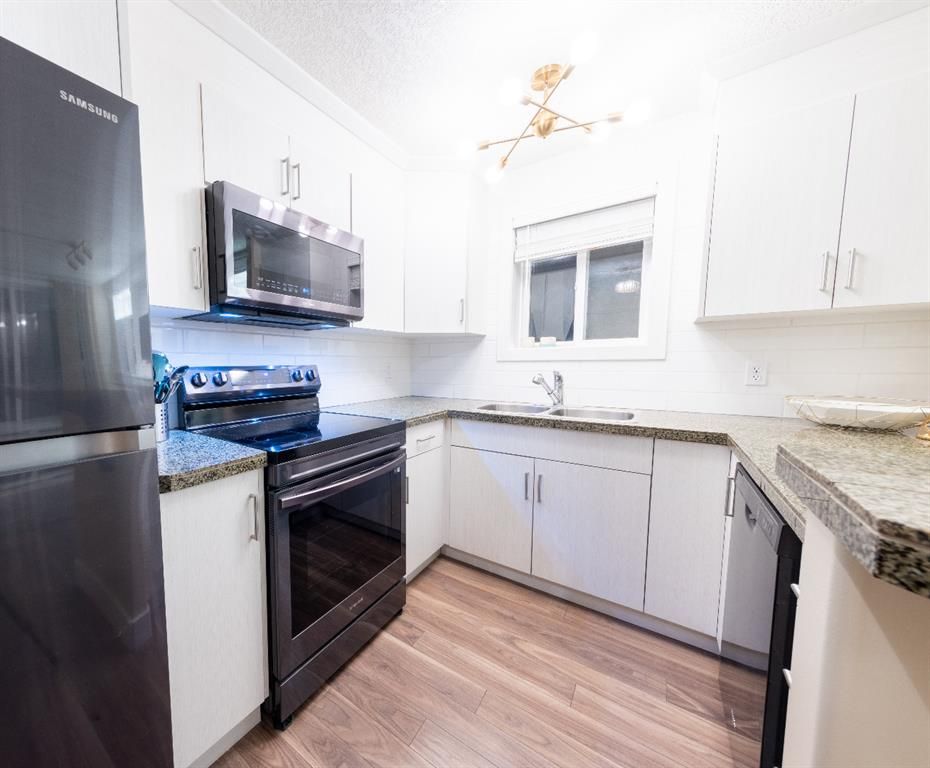 Photo 16: Photos: 103 1727 13 Street SW in Calgary: Lower Mount Royal Apartment for sale : MLS®# A1202865