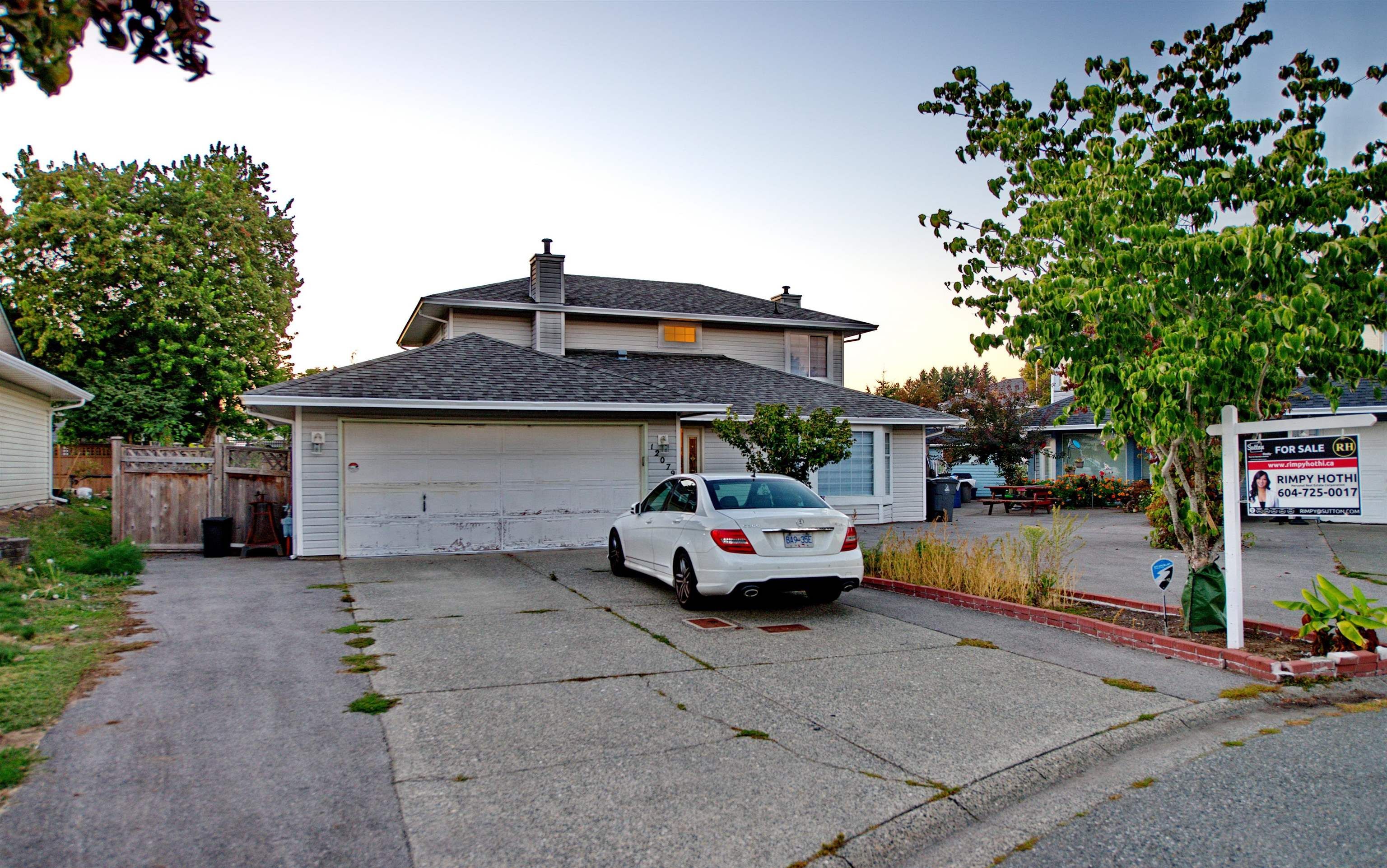 Main Photo: 12079 84A Avenue in Surrey: Queen Mary Park Surrey House for sale : MLS®# R2831853