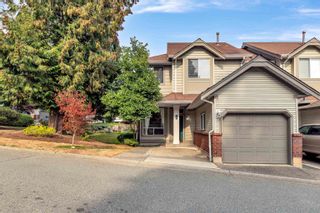 Photo 1: 201 13900 HYLAND Road in Surrey: East Newton Townhouse for sale in "HYLAND GROVE" : MLS®# R2728632