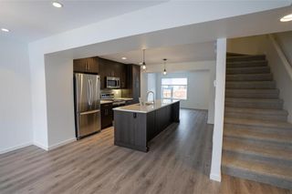 Photo 5: 407 185 Peguis Street in Winnipeg: Devonshire Village Condominium for sale (3K)  : MLS®# 202227229