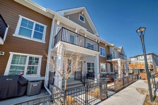 Photo 3: 811 Cranbrook Walk SE in Calgary: Cranston Row/Townhouse for sale : MLS®# A2115536
