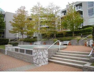 Photo 1: 311 8420 JELLICOE Street in Vancouver: Fraserview VE Condo for sale in "BOARDWALK" (Vancouver East)  : MLS®# V803299