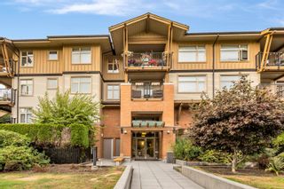 Photo 2: 112 300 KLAHANIE Drive in Port Moody: Port Moody Centre Condo for sale in "TIDES" : MLS®# R2725165