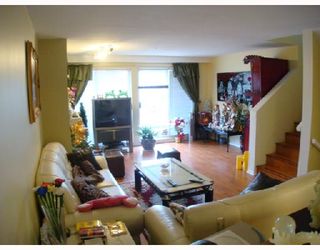 Photo 2: 3457 AMBERLY Place in Vancouver: Champlain Heights Townhouse for sale in "TIFFANY RIDGE" (Vancouver East)  : MLS®# V703168