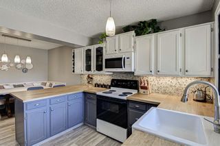 Photo 13: 13 140 Point Drive NW in Calgary: Point McKay Row/Townhouse for sale : MLS®# A1205308