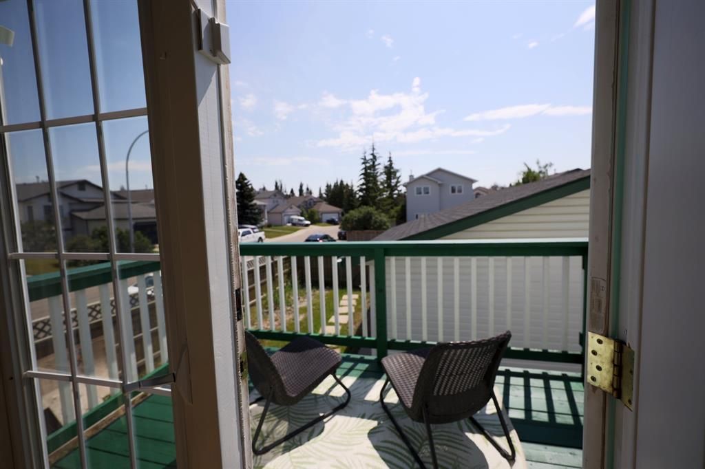 Photo 42: Photos: 111 Woodside Circle NW: Airdrie Detached for sale : MLS®# A1245479