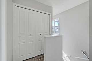 Photo 15: 136 Everridge Gardens SW in Calgary: Evergreen Row/Townhouse for sale : MLS®# A1259244