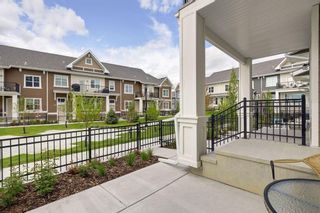 Photo 3: 113 CRANBROOK Walk SE in Calgary: Cranston Row/Townhouse for sale : MLS®# A2076396