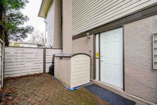 Photo 32: 10634 HOLLY PARK Lane in Surrey: Guildford Townhouse for sale in "HOLLY PARK" (North Surrey)  : MLS®# R2542348